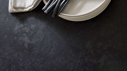 Auszugtisch Interliving aus Keramik in Schwarz Interliving Esszimmer Serie 5123 – Kulissentisch Glas-Keramik Oxid & schwarzes Metall - ca. 250 - 400 x 100 cm