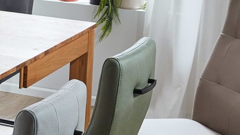 Schwingstuhl PARTNERRING COLLECTION aus Stoff in Grün PARTNERRING COLLECTION Schwingstuhl Hilo olivgrüne Lederoptik Vega 37 & schwarzes Rundrohr