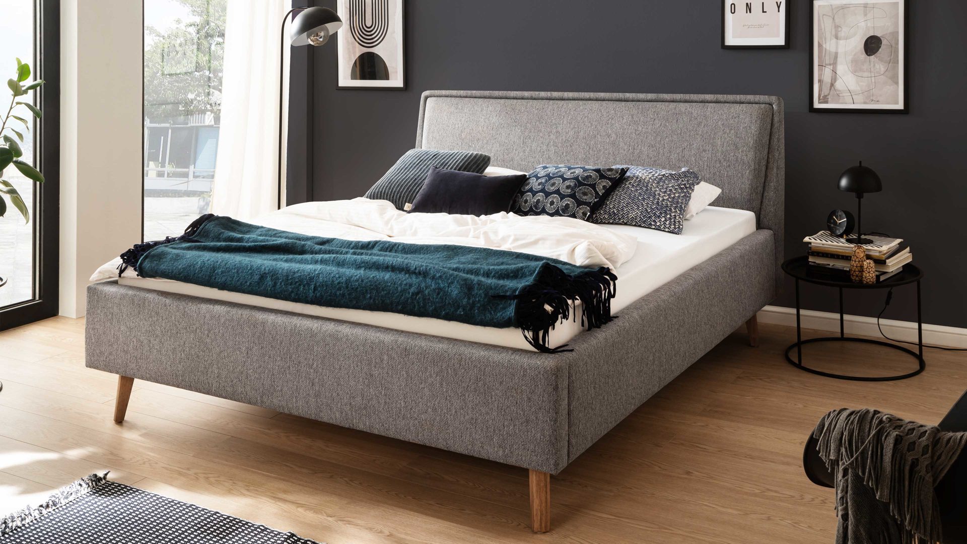 Bettgestell Meise.möbel aus Stoff in Grau Polsterbettgestell Frieda grauer Bezug Stelar 92 & eichefarbene Holzfüße - Liegefläche ca. 180 x 200 cm