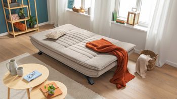 Schlafsofa Actona aus Stoff in Beige Schlafsofa - Schlafcouch als vielseitiges Polstermöbel beiger Stoffbezug & mattschwarzes Gestell