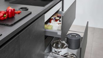 Einbauküche Nobilia® aus Holz in Schwarz nobilia® Einbauküche Laser mit zwei Backöfen Schwarzbeton - zweizeilig