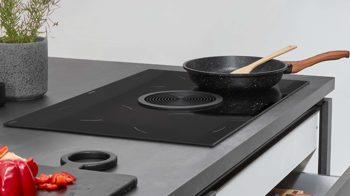 Einbauküche Nobilia® aus Holz in Schwarz nobilia® Einbauküche Laser mit zwei Backöfen Schwarzbeton - zweizeilig