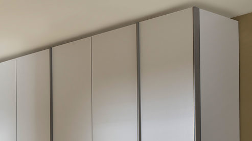 Kleiderschrank Rauch aus Holz in Hellgrau rauch ORANGE Schranksystem Skat - Kleiderschrank mit Inneneinteilung Seidengrau - sechs Türen, Breite ca. 301 cm