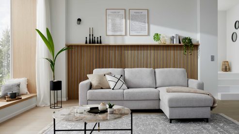 Ecksofa Interliving aus Stoff in Hellgrau Interliving Sofa Serie 4700 - Ecksofa mit Schlaffunktion silberfarbener Bezug Toni & schwarze Metallfüße - Stellfläche ca. 270 x 190 cm